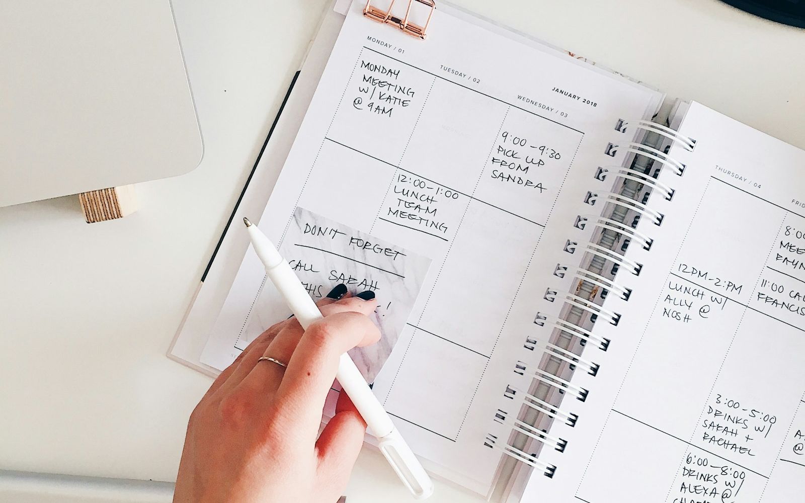 A blank notepad and a pen.