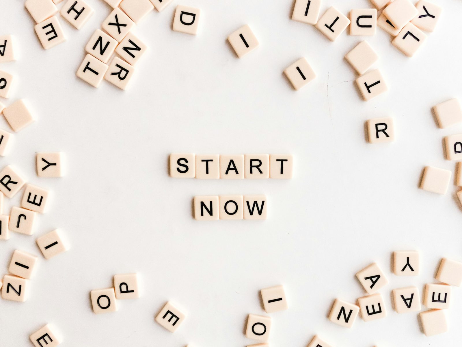 Letter tiles spelling start now.
